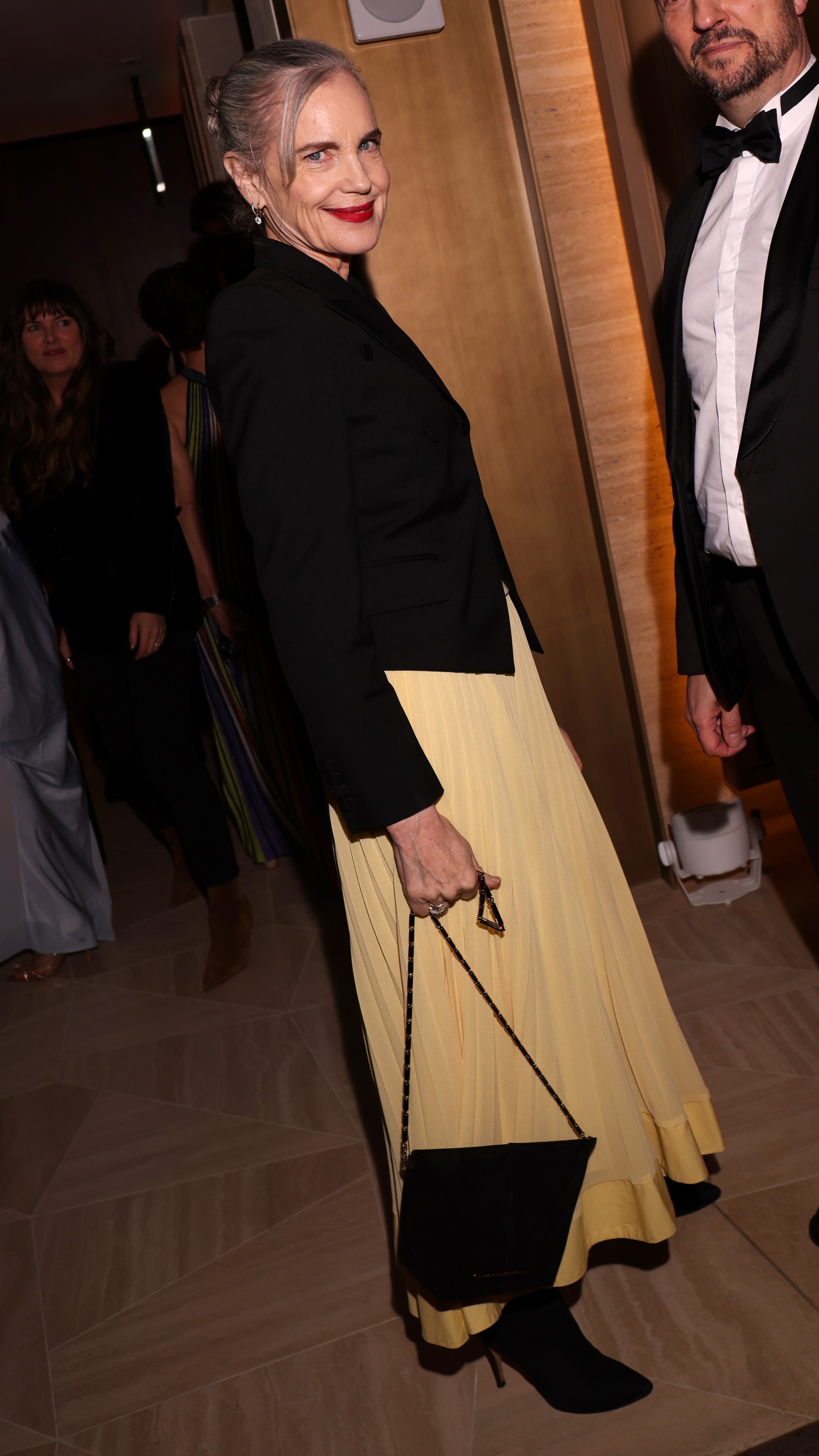 Elizabeth McGovern holds her handbag as she attends the BAFTA Invest in Talent Gala 2026