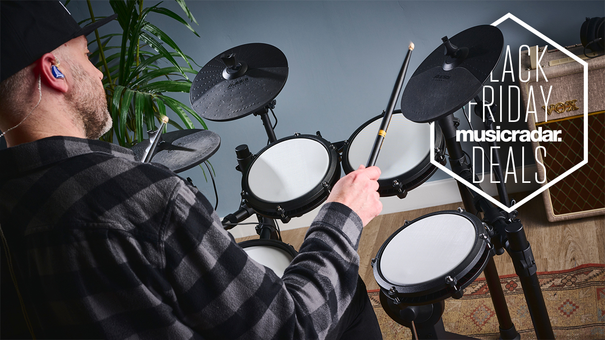 Man in a hat playing the Alesis Nitro Max e-kit