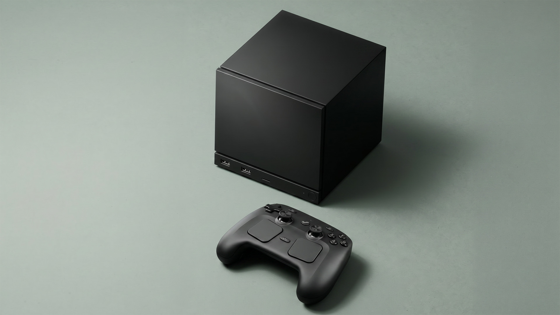 Valve's Steam Machine and controller on a green backdrop