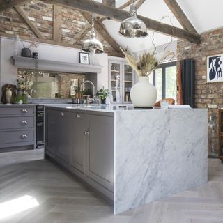 Grey kitchen with marble kitchen island