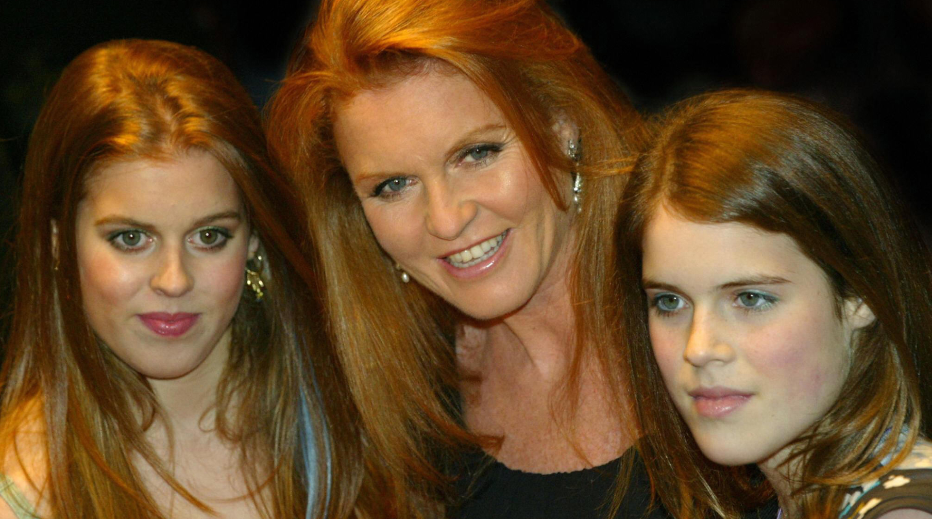 Princess Beatrice, Sarah Ferguson, and Princess Eugenie pose together in 2004.