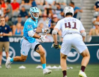 Premier Lacrosse League founder Paul Rabil in the light blue uniform.