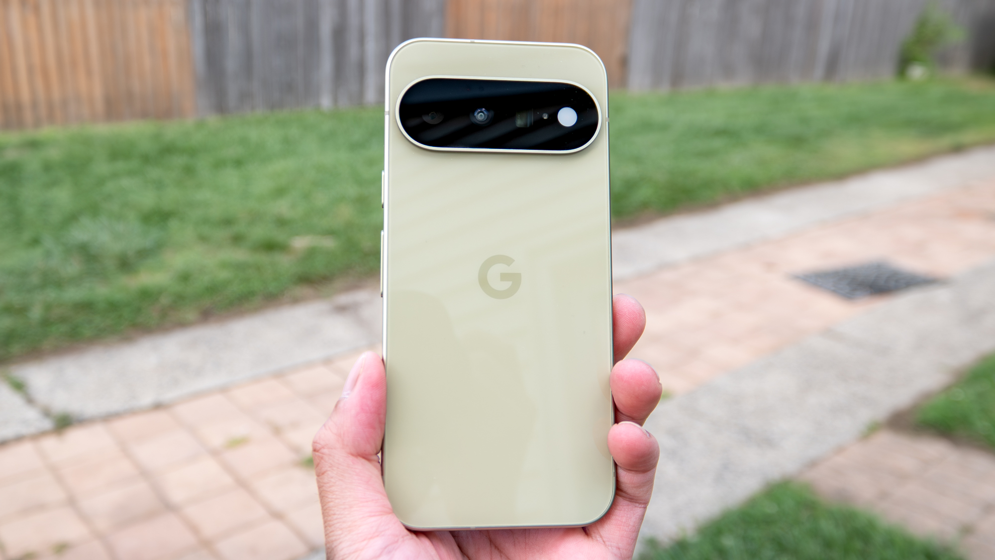 Google Pixel 11 held in the hand.