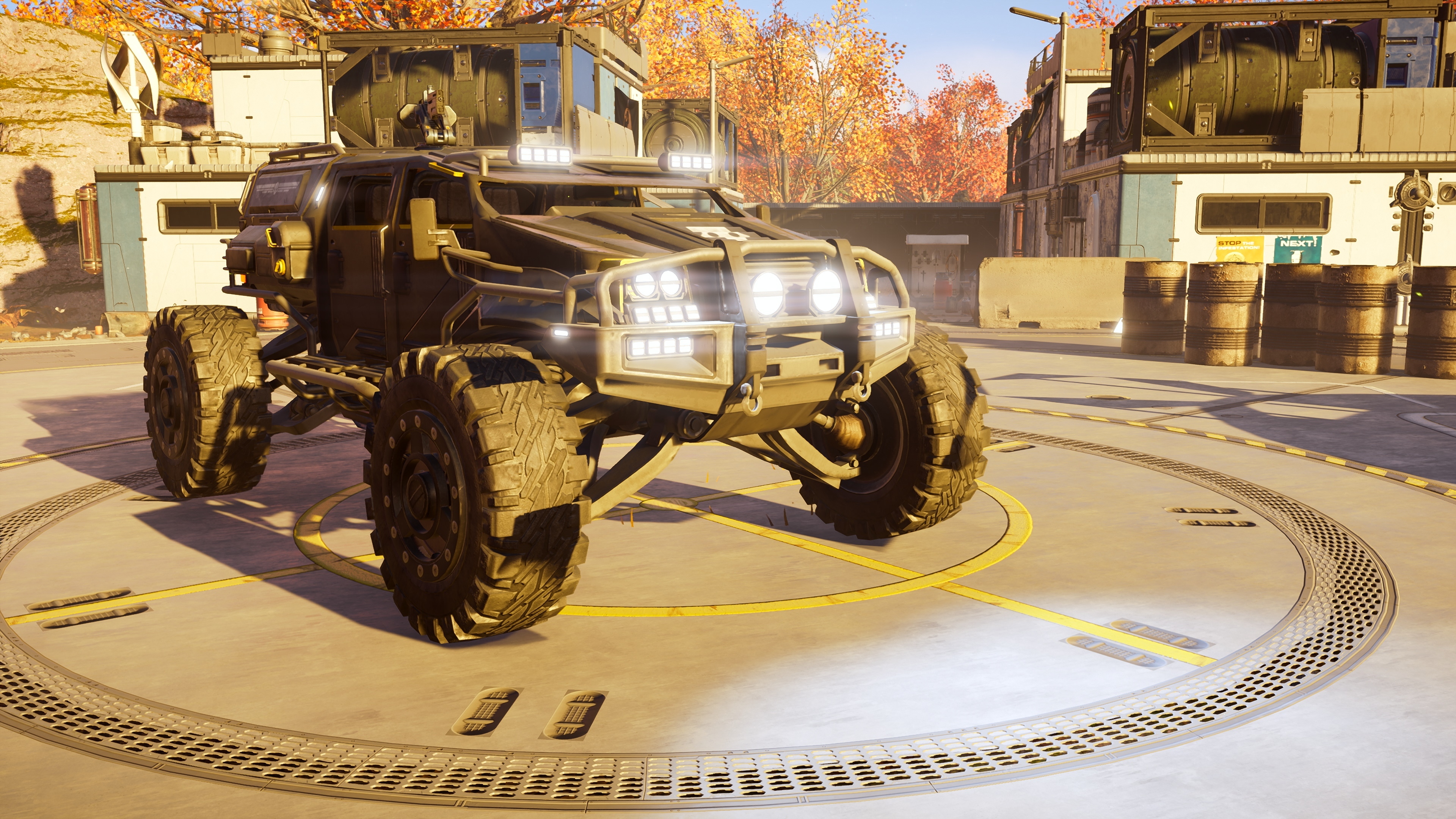 A screenshot of the Supply FRV in Helldivers 2, showing it parked on a circular dais inside a Helldivers base.