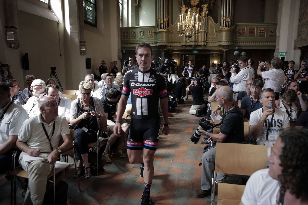 John Degenkolb heads to the stage at the press conference