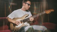 Cory Wong plays an Ernie Ball Music Man StingRay II electric guitar