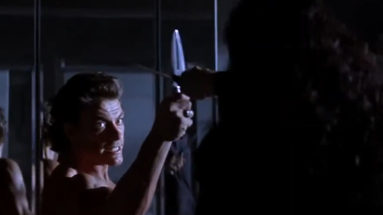 Jean-Claude Van Damme in a vicious knife fight in Timecop
