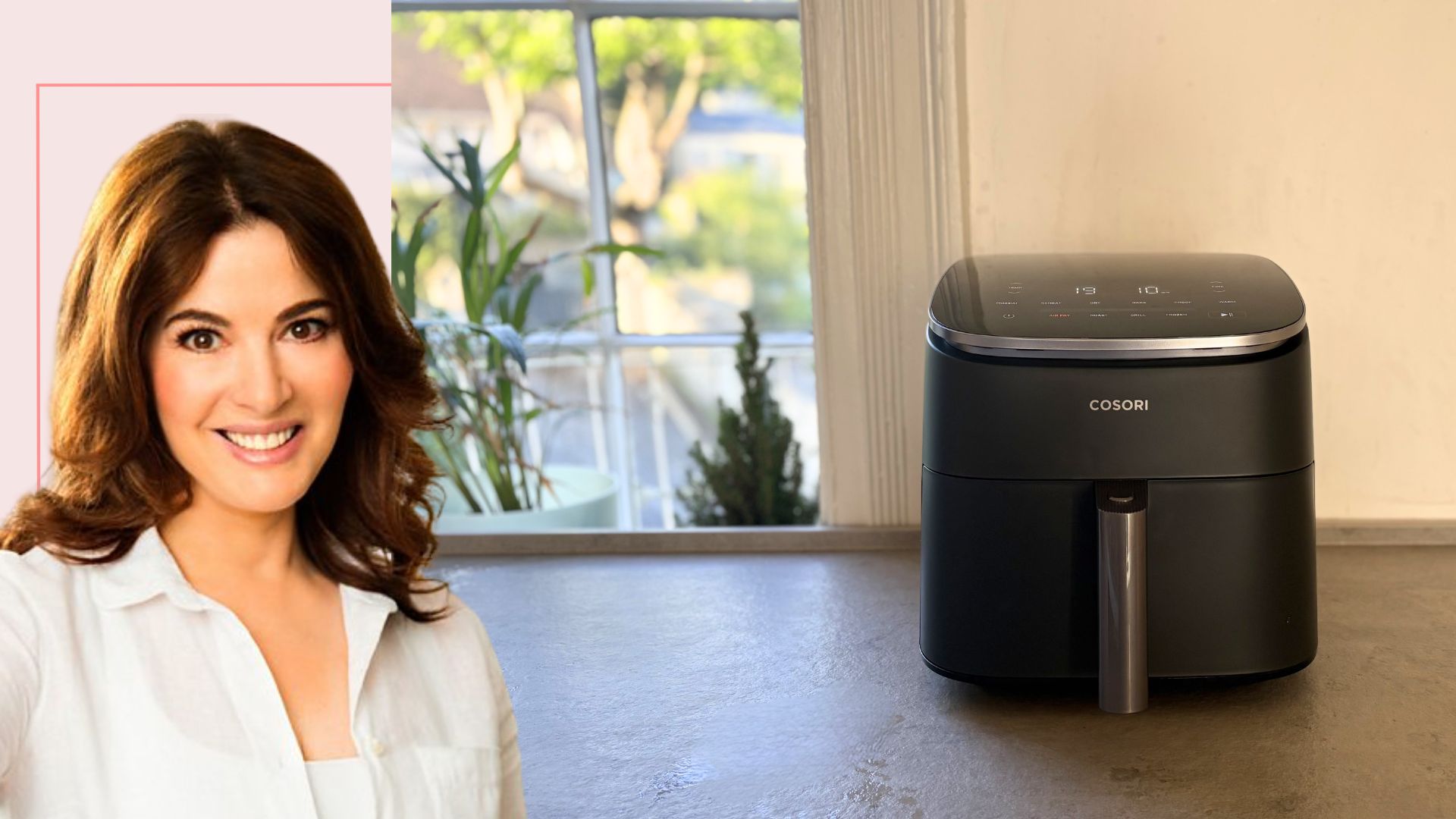 The Cosori TurboBlaze 6L Air Fryer on the counter with a cutout of Nigella Lawson beside it