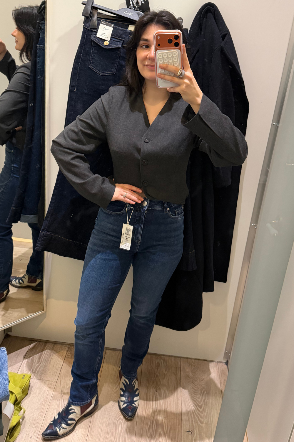 Sofia wearing straight-leg jeans