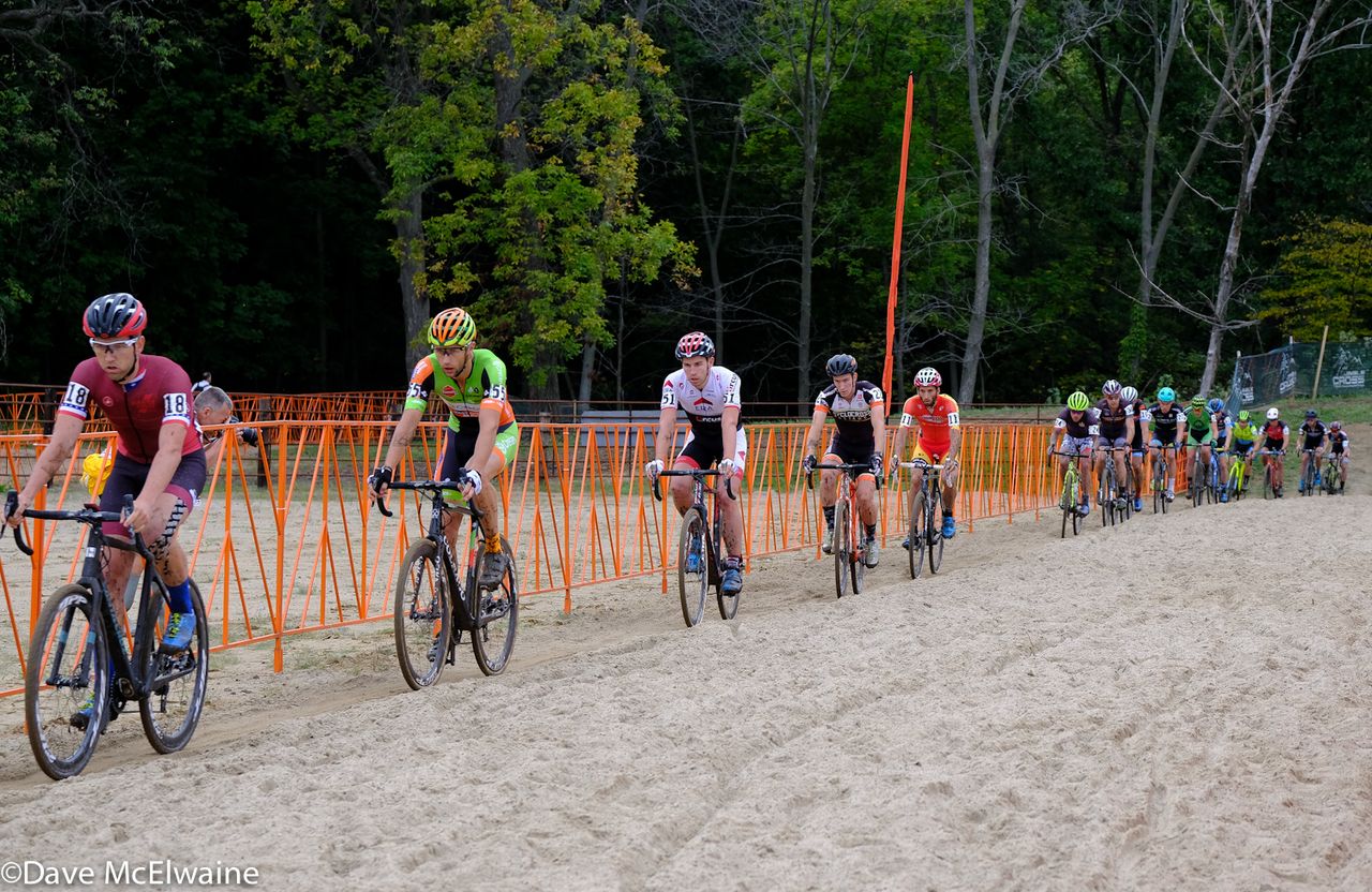 Tobin Ortenblad (Santa Cruz) riding in a long train of racers through the sand