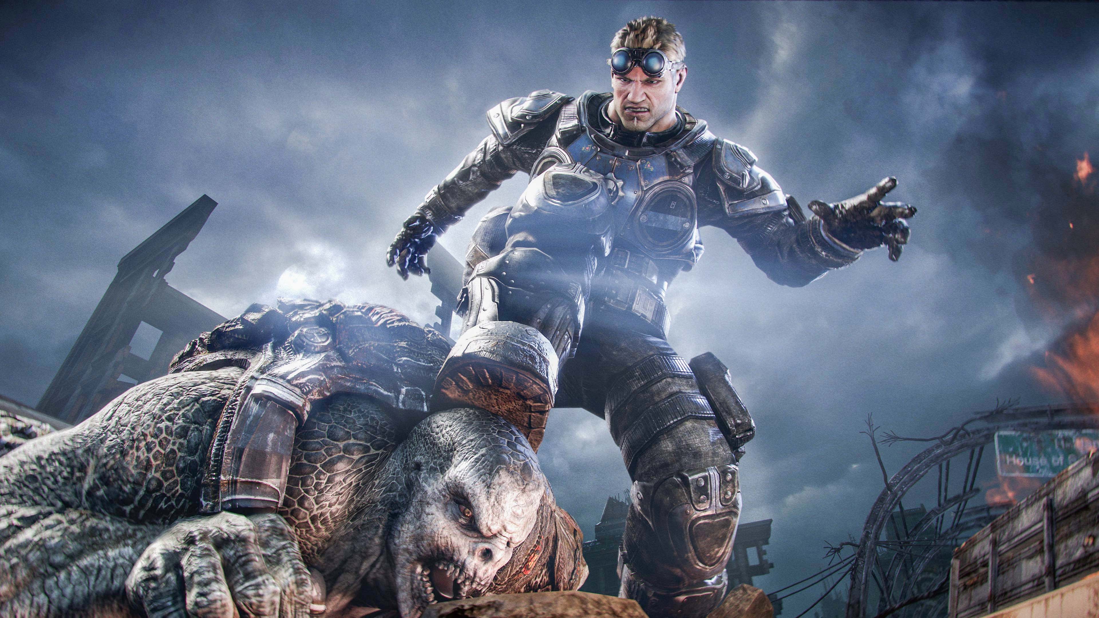 A screenshot from Gears of War: Reloaded showing an armored man stepping on an abomination&#039;s head. 