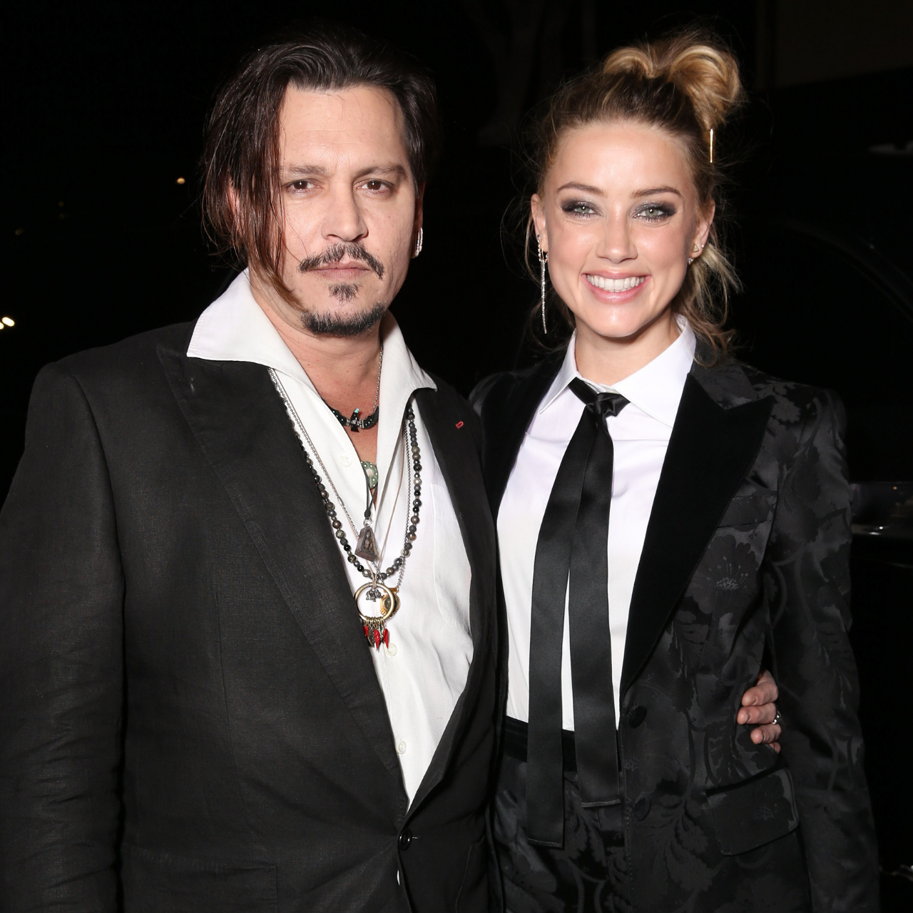 Johnny Depp and Amber Heard attend the premiere of The Danish Girl 2015