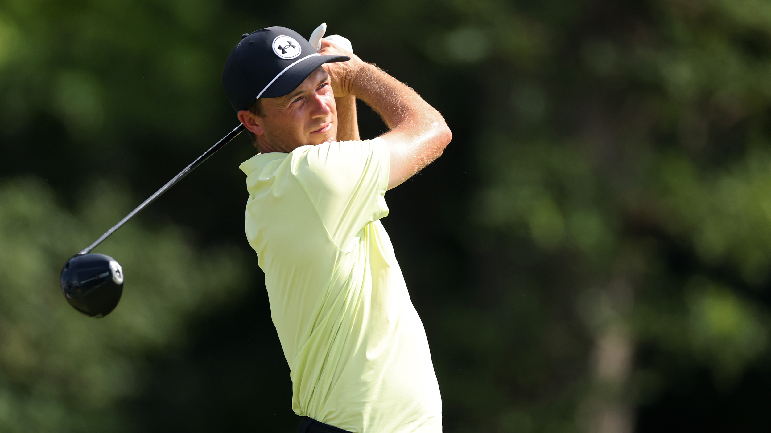 Jordan Spieth holds his finish on a drive