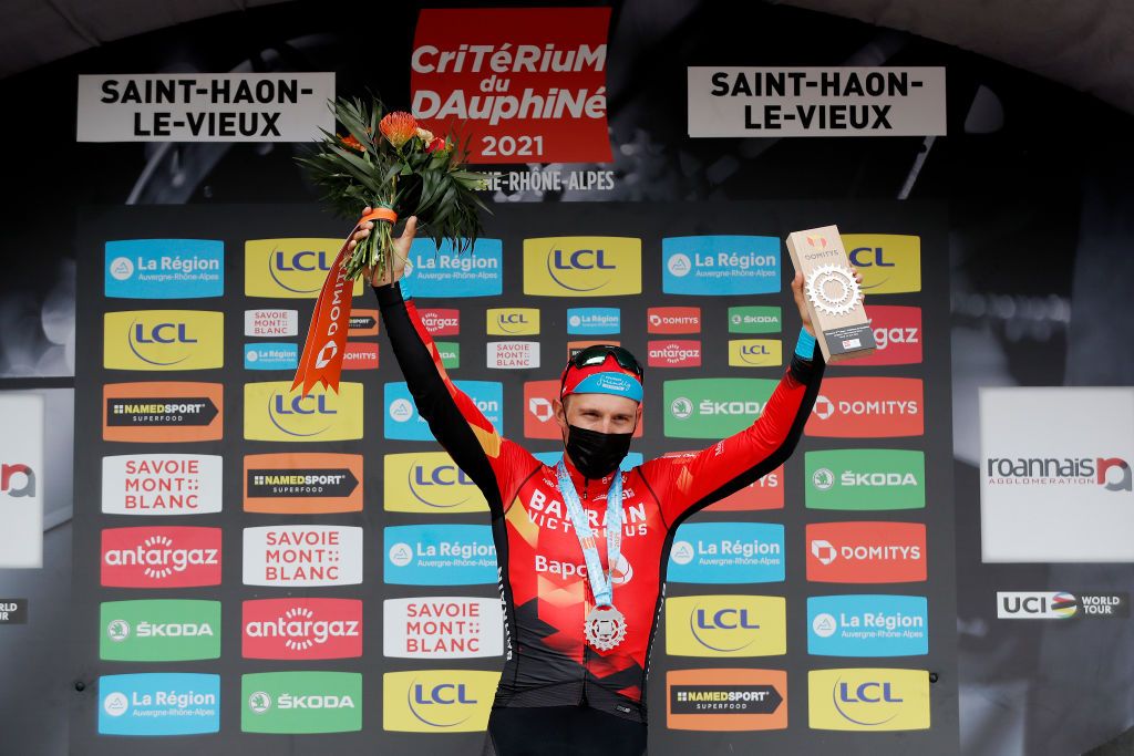 SAINT HAON LE VIEUXON FRANCE JUNE 01 Sonny Colbrelli of Italy and Team Bahrain Victorious stage winner celebrates at podium during the 73rd Critrium du Dauphin 2021 Stage 3 a 1722km stage from Langeac to Saint Haon Le Vieuxon Trophy UCIworldtour Dauphin dauphine June 01 2021 in Saint Haon Le Vieuxon France Photo by Bas CzerwinskiGetty Images