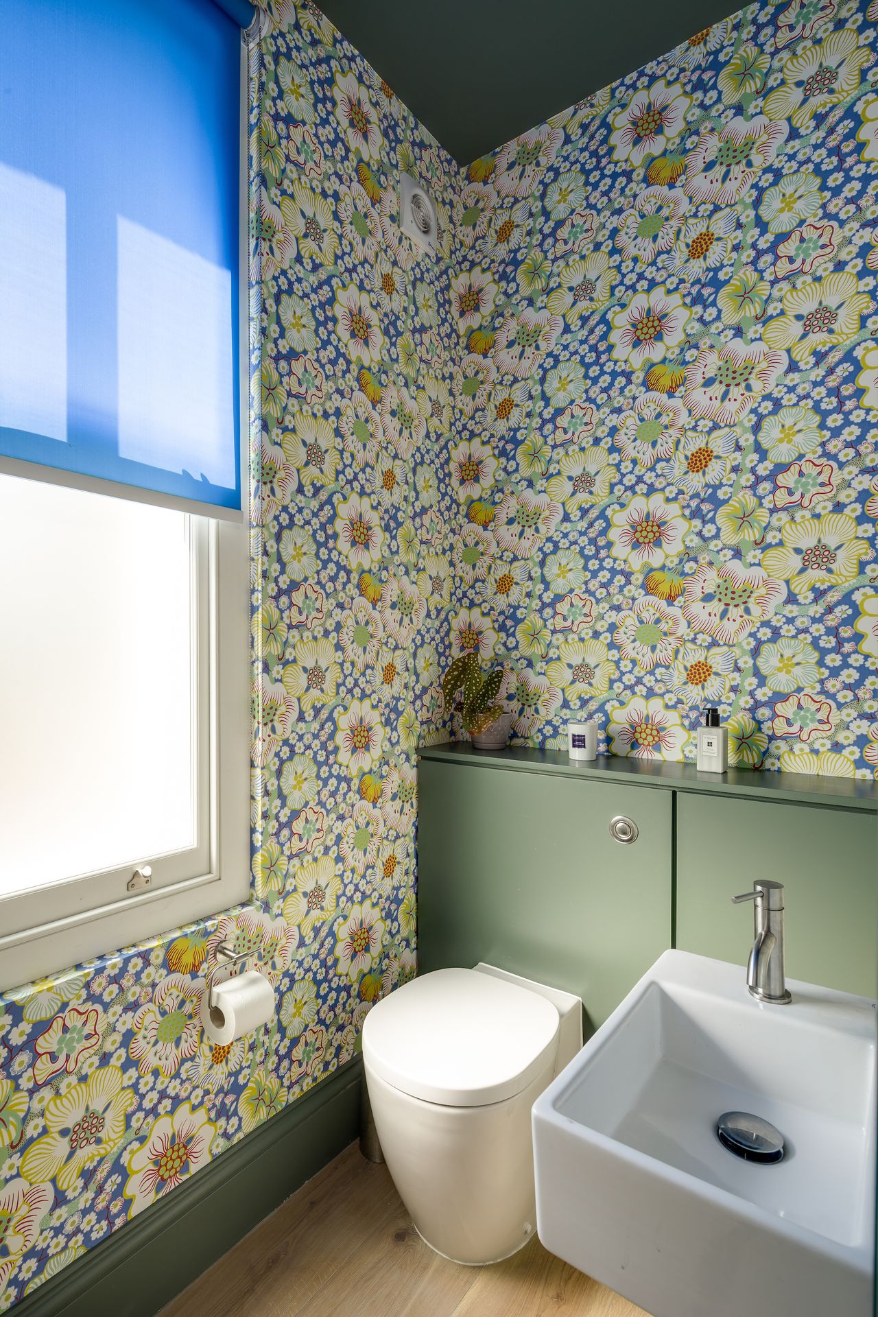 downstairs bathroom with floral wallpaper
