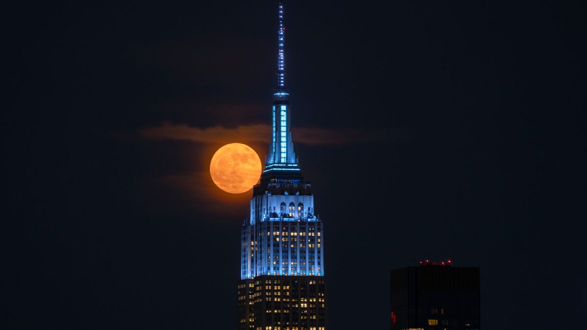 'Strawberry Moon' in pictures: Major lunar standstill sees June's full moon hang low in the sky
