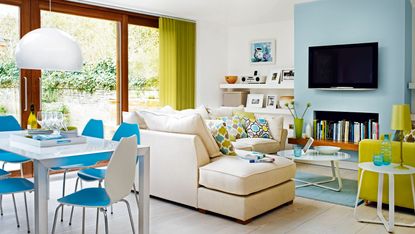 open plan living room with blue wall