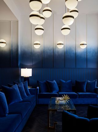 a blue sofa in a restaurant design