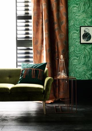 Caramel curtains in a green room