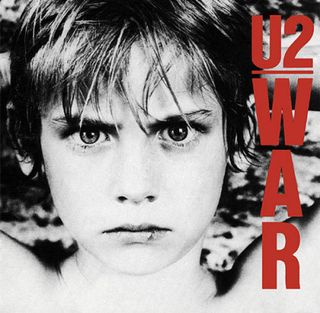 The cover of U2's War, featuring a boy staring intensely at the camera
