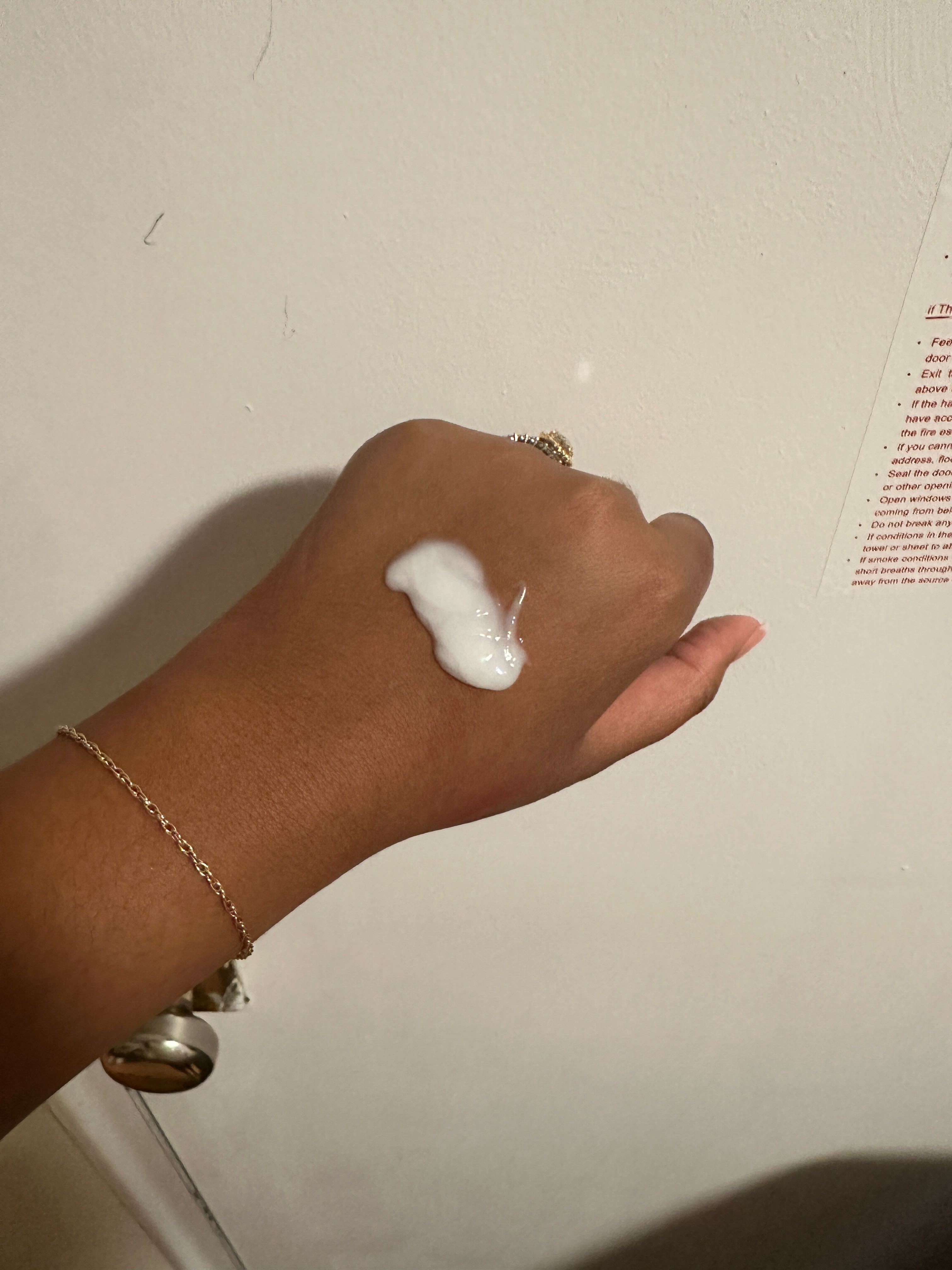 Ariel Baker testing Crown Affair The Leave-In Conditioner Cream.