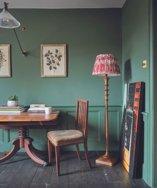 Green dining room with vintage furniture