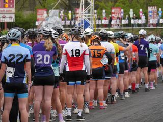 The 27 teams qualifying for the women's race line up in pole order to be introduced, each by name and hometown.JPG