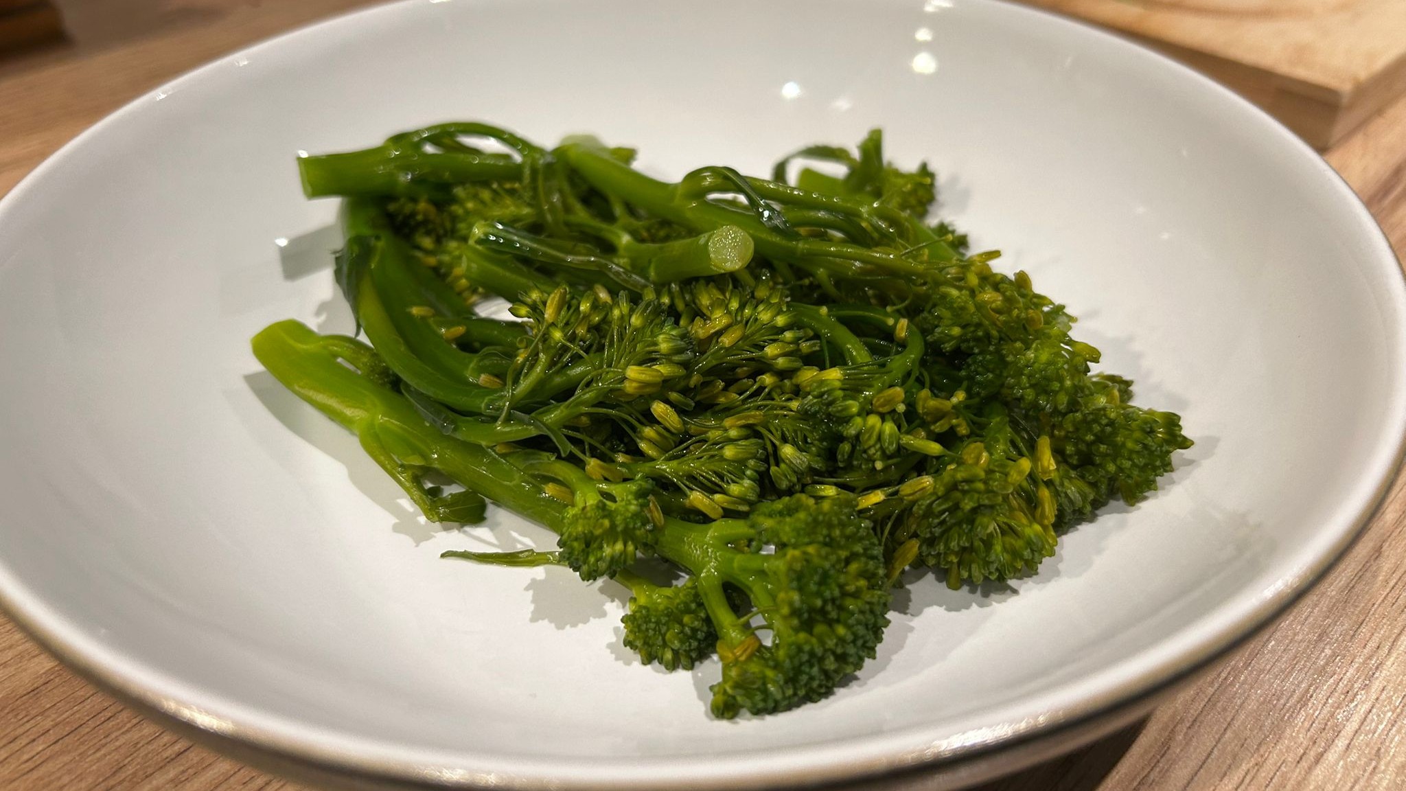 Broccoli steamed using Ninja Foodi PossibleCooker served on plate