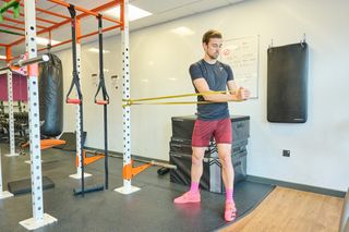 Andy Turner using resistance bands as part of his 12 week strength training program for cyclists