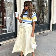 Best shoes to wear with full skirts: @slipintostyle wears a full yellow skirt with ballet flats