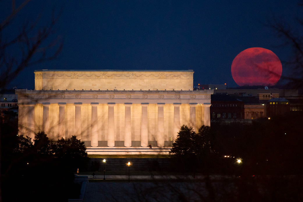 A so-called supermoon full moon rises over the Lincoln Memorial in Washington D.C. in this NASA photograph by veteran space photographer Bill Ingalls in 2011. Ingalls has shared tips to photograph the Nov. 14 supermoon, which will be the closest full moon