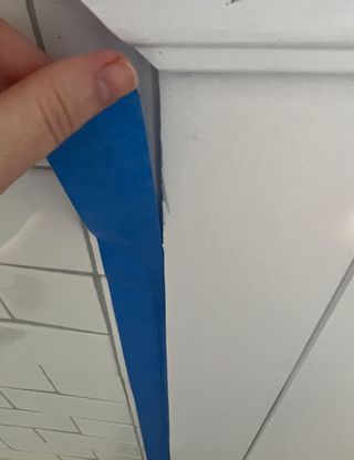 Taping off wall in bathroom