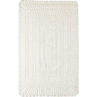 textured cream area rug