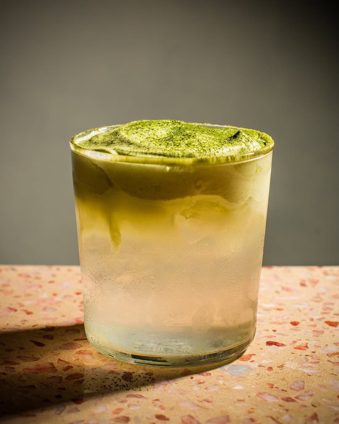 Subtropical rum cocktail topped with pandan cream foam at Bound in Hong Kong