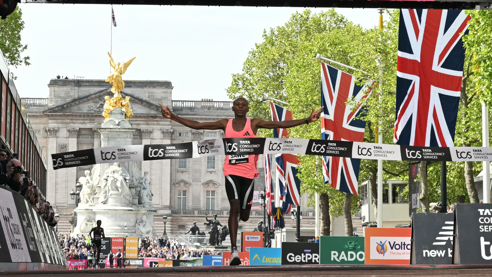Kenya's Sabastian Sawe crosses the line to win the men's race in a new world record time at the 2026 London Marathon in central London on April 26, 2026