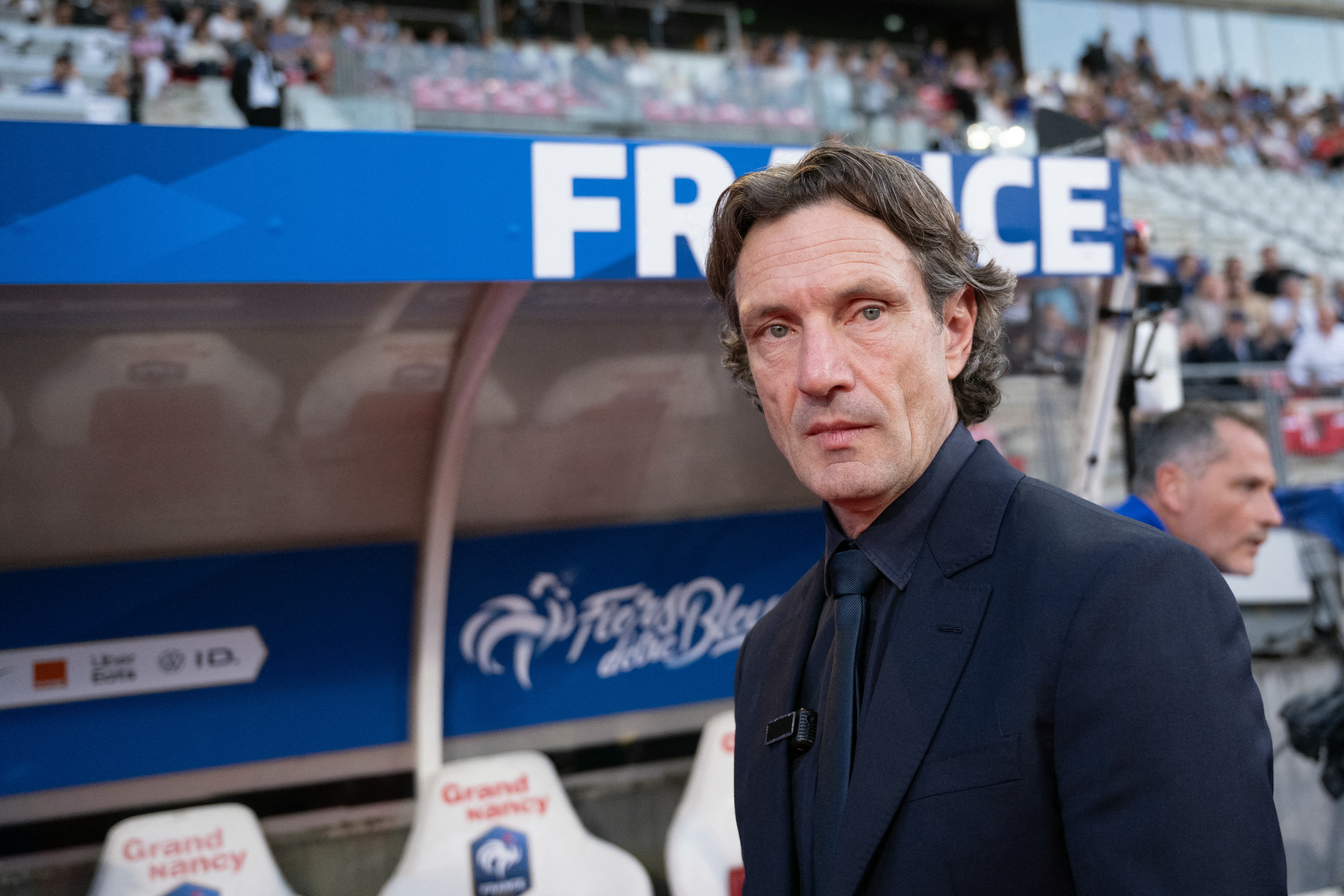 Laurent Bonadei in the dugout for France Women