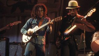 Bob Marley performing live on stage at the Odeon with bass player, Aston 'Family Man' Barrett