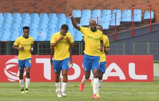 Mosa Lebusa celebrates his goal with teammates