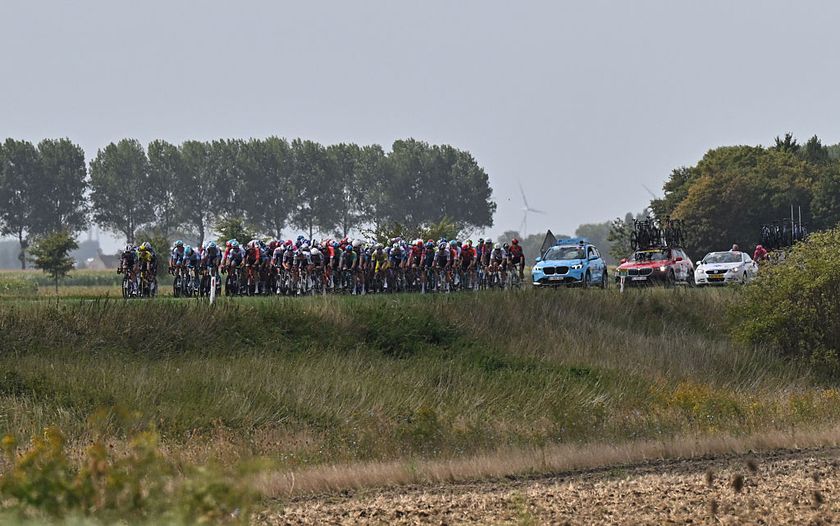 BRESKENS, NETHERLANDS - AUGUST 20: A general view of the peloton competing during the 20th Renewi Tour 2025, Stage 1 a 182.6km stage from Terneuzen to Breskens - Sluis / #UCIWT / on August 20, 2025 in Breskens, Netherlands. (Photo by Luc Claessen/Getty Images)