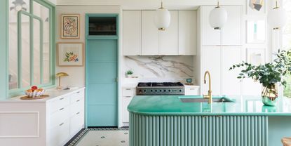 white kitchen with aqua lava stone countertops with matching panelling and mint green window trims