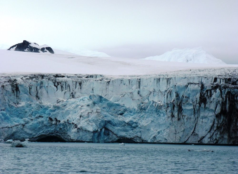 Ice from an Antarctic glacier falls into the sea.