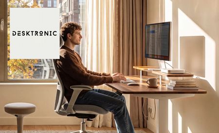 Man sitting at Desktronic desk