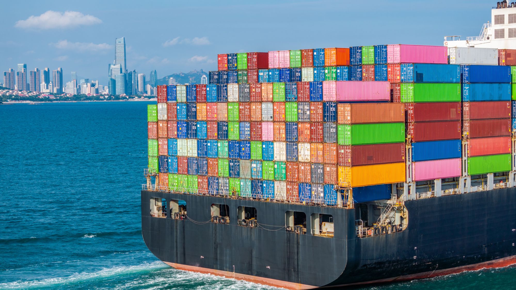 A container ship with containers at sea