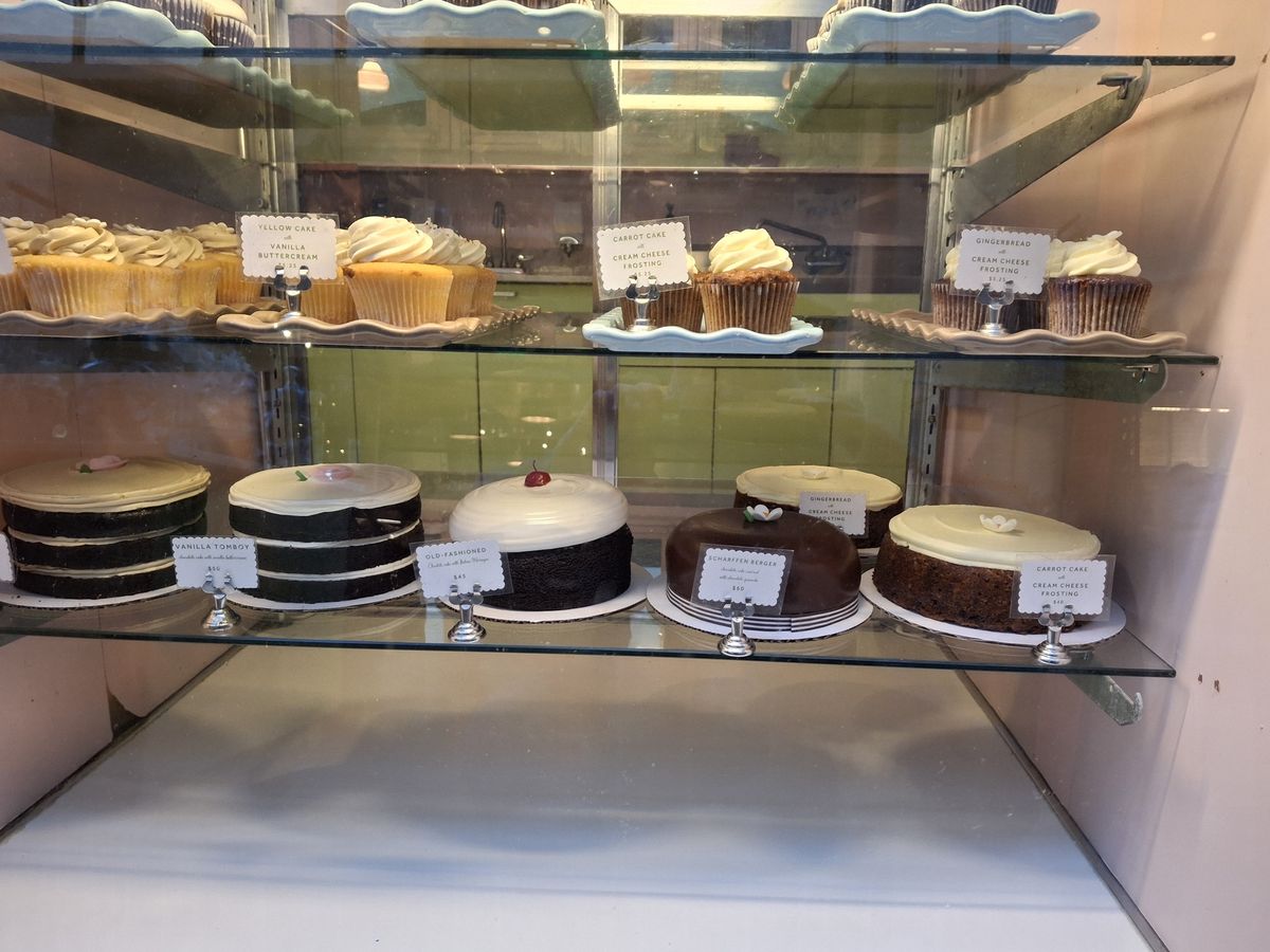 photo of cakes in display case shot by Galaxy A35