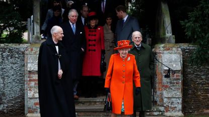 britains queen elizabeth ii c and britains prince philip, duke of edinburgh r lead out other members of the family with reverend canon jonathan riviere l as they leave after attending the royal familys traditional christmas day church service at st mary magdalene church in sandringham, norfolk, eastern england, on december 25, 2017 photo by adrian dennis afp photo by adrian dennisafp via getty images