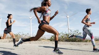 Runners wearing Nike running shoes