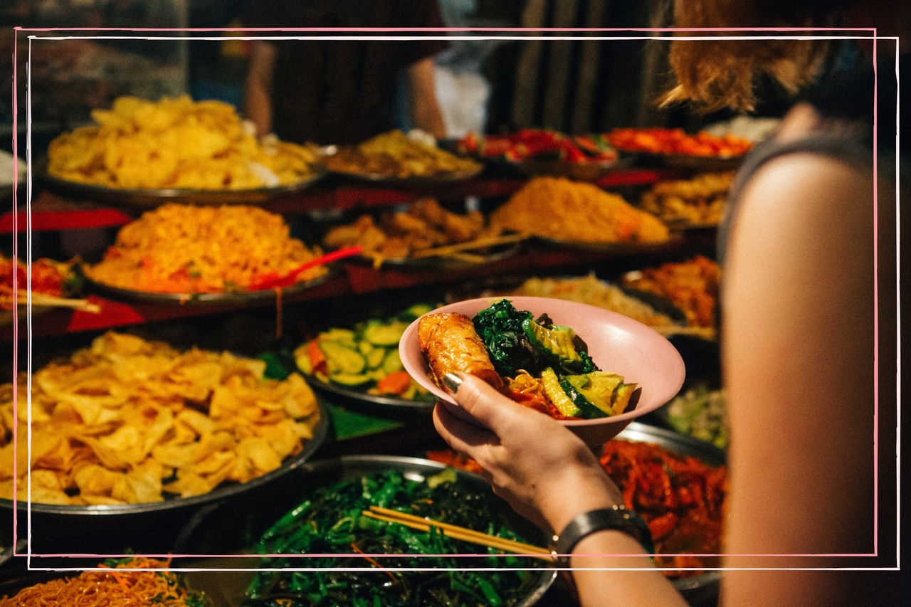 A woman eating Thai food, one of the healthiest diets in the world