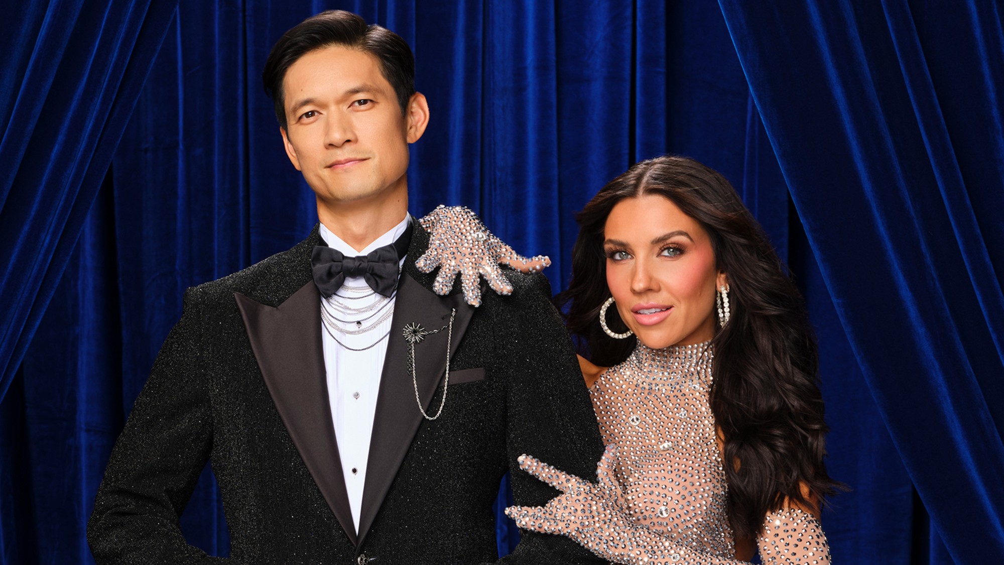 From left to right: Harry Shum Jr. posing with Jenna Johnson for a Dancing with the Stars image. 
