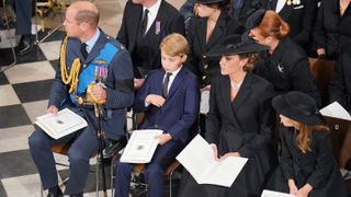 Prince William, Prince of Wales, Prince George of Wales, Catherine, Princess of Wales, Princess Charlotte of Wales and (second row) Jack Brooksbank, Princess Eugenie and Sarah, Duchess of York on September 19, 2022