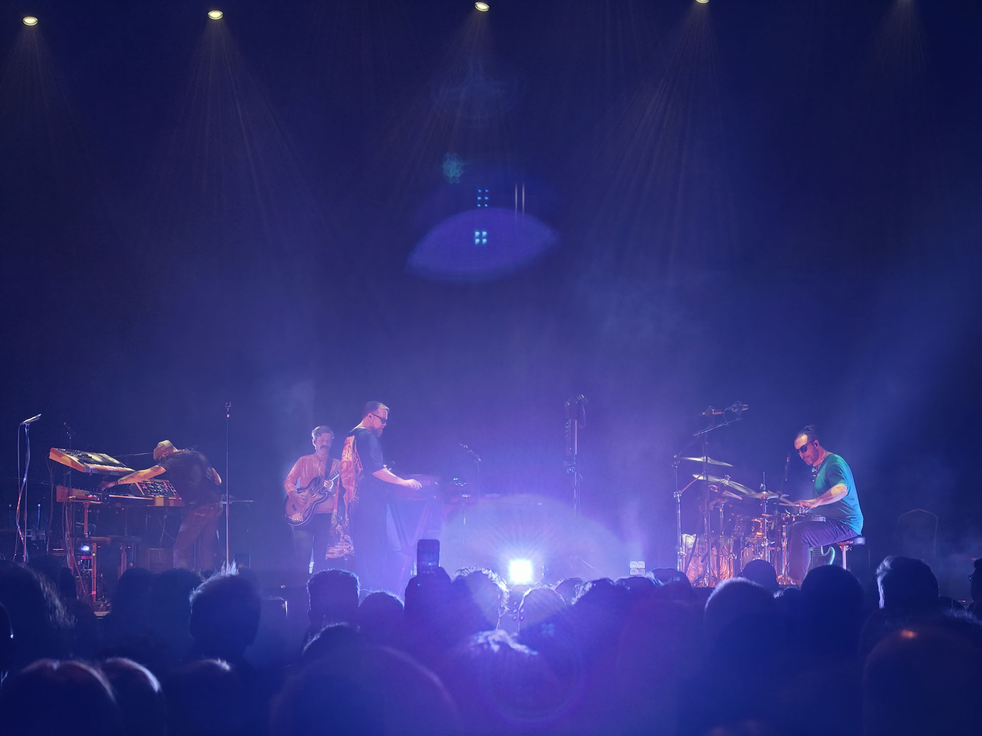 A photo of John Grant playing live.